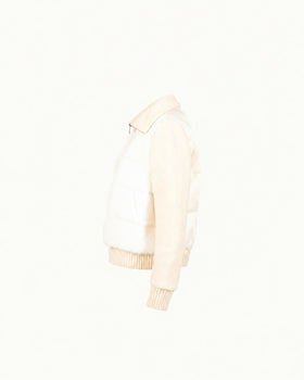 Mink Puffer Knit Jacket in ivory, side view showing the knitted wool sleeve